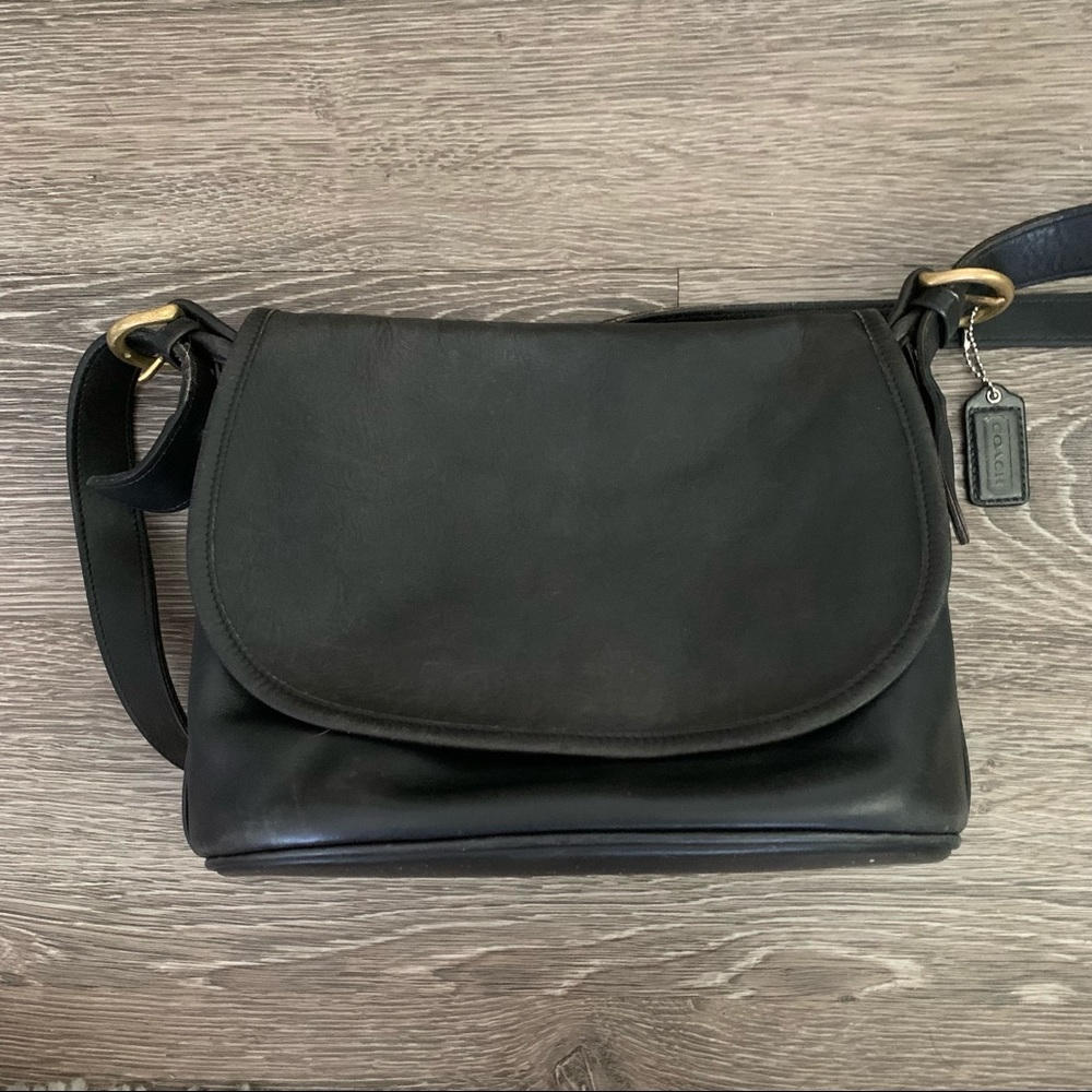 - Coach black vintage leather crossbody